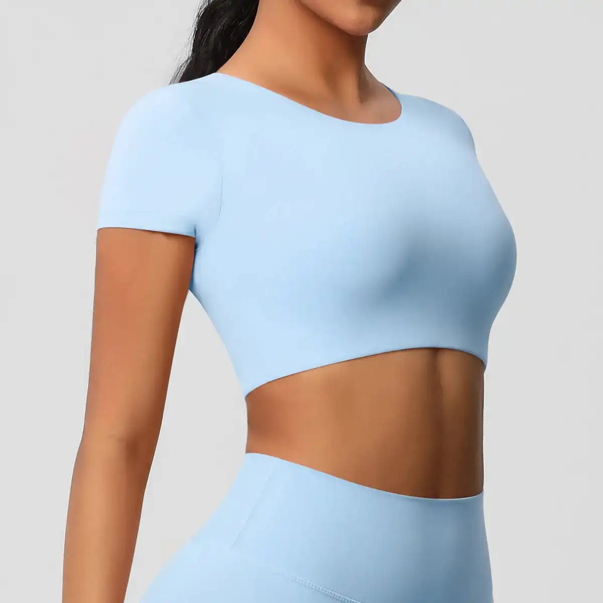 Apex Sculpt cropped gym/yoga top sky blue side